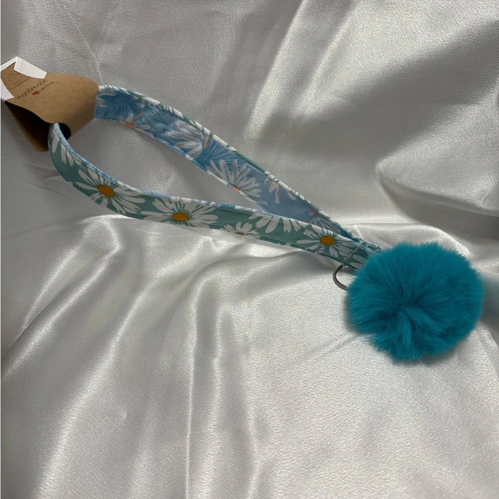 Handmade Green and Blue Daisy Wristlet Keychain with Blue Pompom